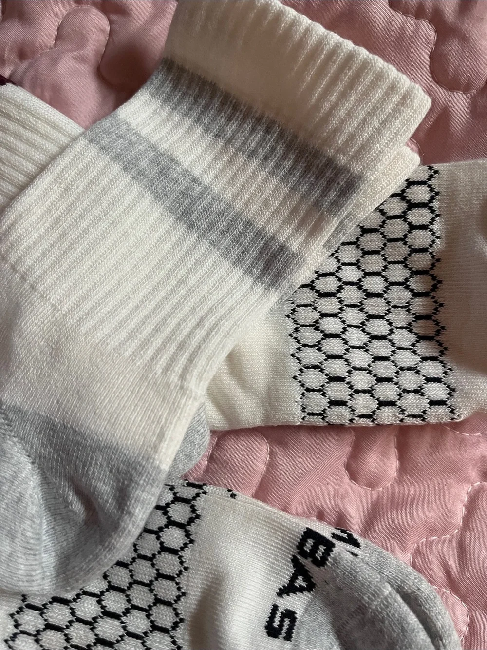 Men's White Crew Athletic Socks with Black Pattern bombas
